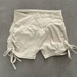 PCHEE Bum V Waist Scrunch Butt Shorts in the Color NUDE/TAN (Women’s Medium)